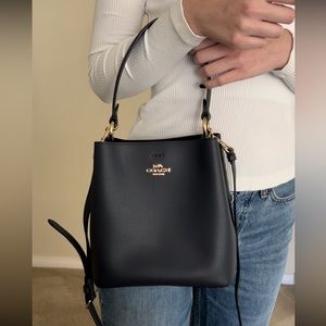 Coach Navy Bucket Bag with Gold Hardware